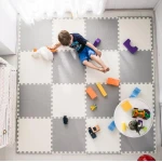 Duża mata piankowa, puzzle Ricokids 60x60cm 4 szt białe i szare 